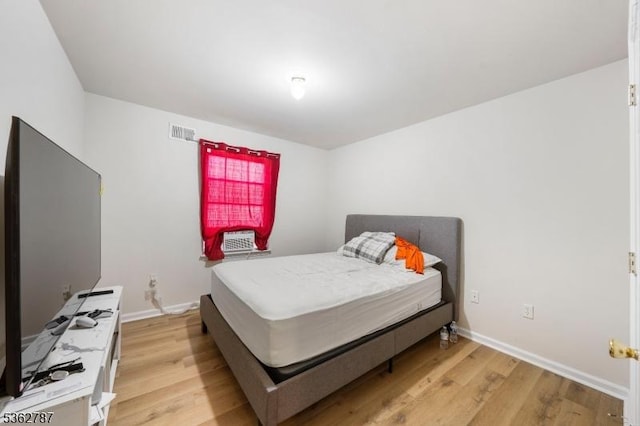 303-305 W Runyon St, Newark City, NJ 07108 - bedroom with light wood-type flooring and baseboards