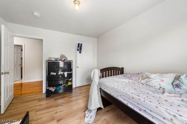 303-305 W Runyon St, Newark City, NJ 07108 - bedroom with light wood-type flooring and baseboards