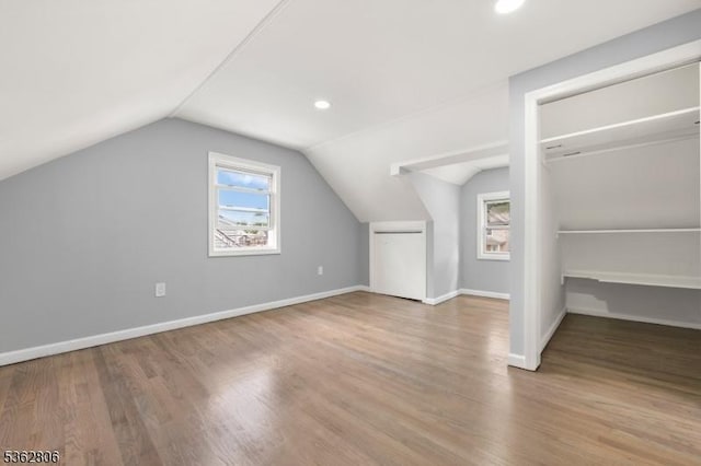 501 E 2nd Ave, Roselle Boro, NJ 07203 - additional living space with vaulted ceiling, wood finished floors, baseboards, and recessed lighting