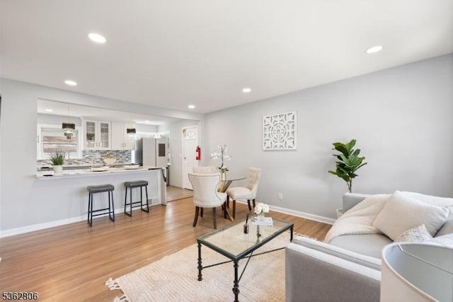 501 E 2nd Ave, Roselle Boro, NJ 07203 - living room with light wood finished floors, recessed lighting, and baseboards