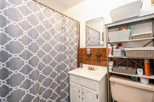 46A James St Unit B, Newark City, NJ 07102 - full bathroom with vanity, tile walls, toilet, wainscoting, and a shower with shower curtain