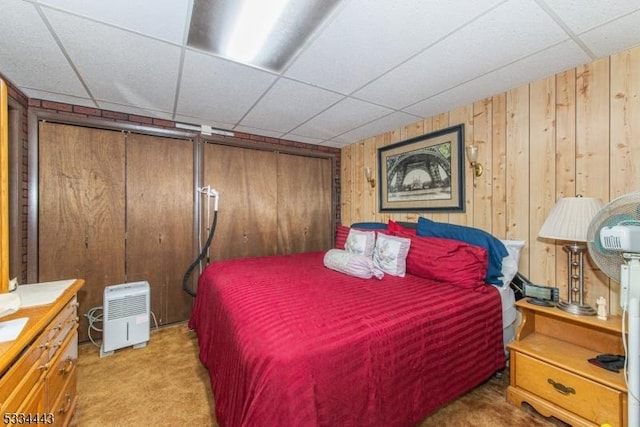 138 Bartley Flanders Rd, Mount Olive Twp, NJ 07836 - bedroom featuring a drop ceiling, light carpet, and wood walls