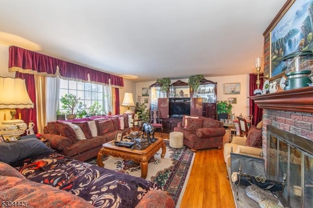 138 Bartley Flanders Rd, Mount Olive Twp, NJ 07836 - living area featuring wood finished floors and a brick fireplace