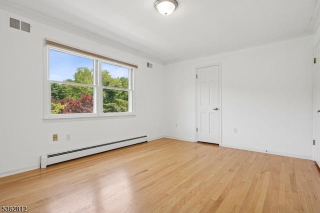 8 Debra Ct, Scotch Plains Twp, NJ 07076 - empty room with baseboard heating, light wood-style flooring, baseboards, and crown molding