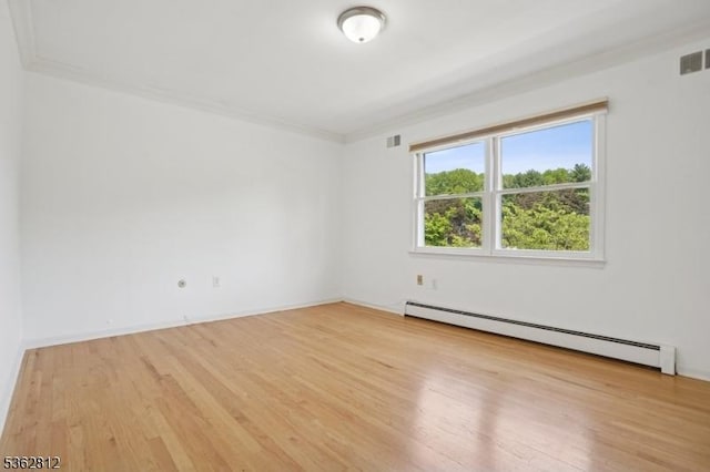 8 Debra Ct, Scotch Plains Twp, NJ 07076 - empty room featuring a baseboard radiator, wood finished floors, and baseboards