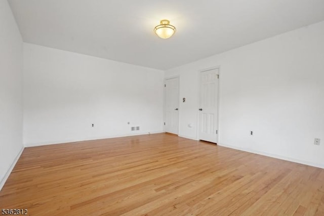 8 Debra Ct, Scotch Plains Twp, NJ 07076 - spare room with light wood-type flooring and baseboards