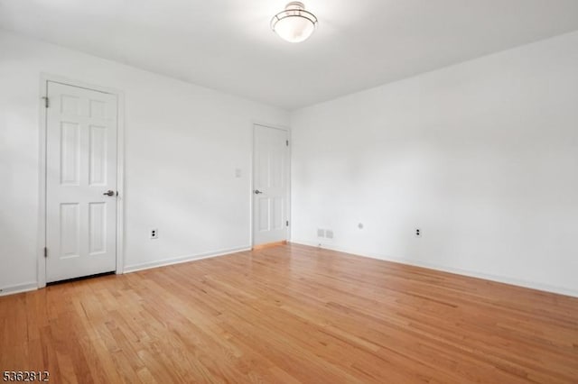 8 Debra Ct, Scotch Plains Twp, NJ 07076 - unfurnished room with light wood-type flooring and baseboards
