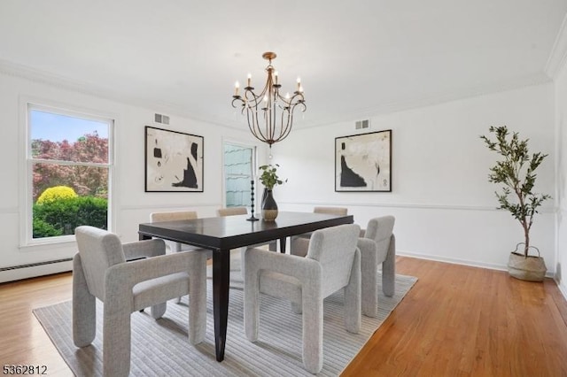 8 Debra Ct, Scotch Plains Twp, NJ 07076 - dining space featuring a chandelier, light wood-style flooring, and ornamental molding