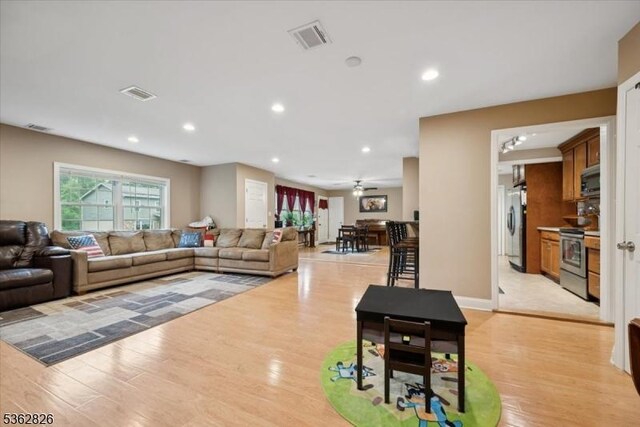 13 Oklahoma Trl, Hopatcong Boro, NJ 07843 - living room with light wood-style flooring, ceiling fan, and recessed lighting
