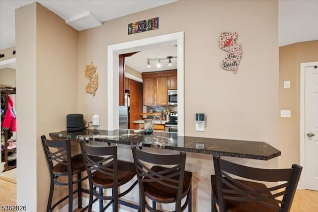 13 Oklahoma Trl, Hopatcong Boro, NJ 07843 - dining area featuring rail lighting and light wood-style floors