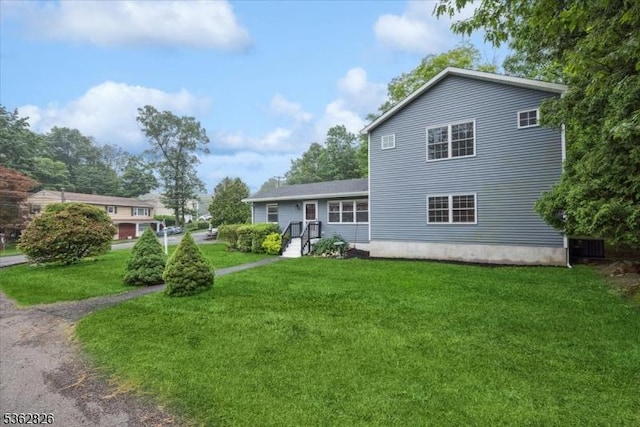 13 Oklahoma Trl, Hopatcong Boro, NJ 07843 - rear view of property with a lawn