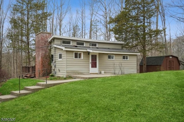 907 Meadowbrook Rd, Stillwater Twp, NJ 07860 - rear view of property with a chimney, a patio area, and a yard