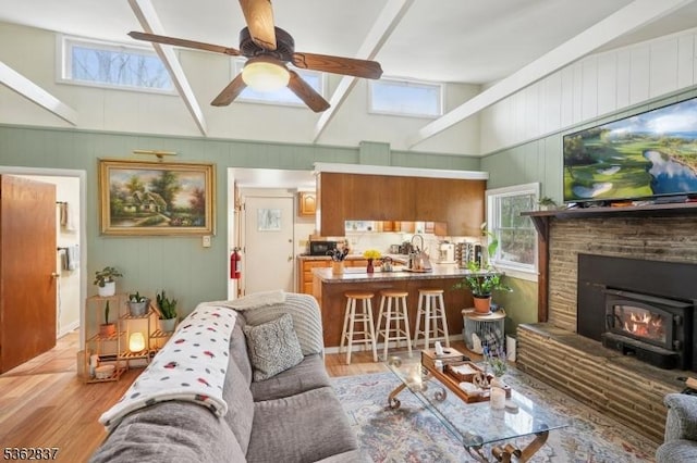 907 Meadowbrook Rd, Stillwater Twp, NJ 07860 - living room with vaulted ceiling, healthy amount of natural light, a ceiling fan, and light wood finished floors