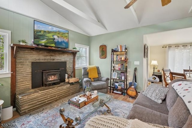 907 Meadowbrook Rd, Stillwater Twp, NJ 07860 - living room featuring wood finished floors, plenty of natural light, and a warm lit fireplace