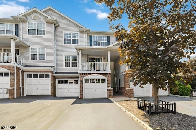 815 Buckland Ct, Denville Twp, NJ 07834 - multi unit property featuring a garage, driveway, and brick siding