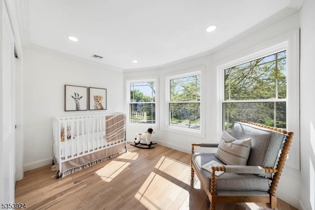 519 Lenox Ave, Westfield Town, NJ 07090 - bedroom with ornamental molding, multiple windows, baseboards, wood finished floors, and recessed lighting