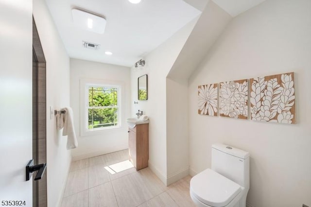 519 Lenox Ave, Westfield Town, NJ 07090 - bathroom with vanity, toilet, baseboards, and recessed lighting