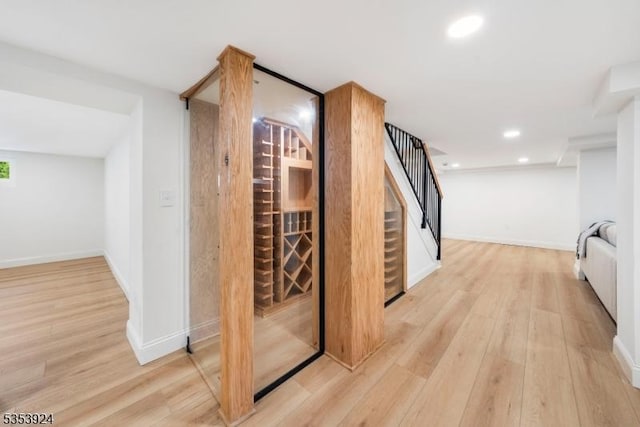 519 Lenox Ave, Westfield Town, NJ 07090 - hallway featuring light wood-style floors, stairs, baseboards, and recessed lighting