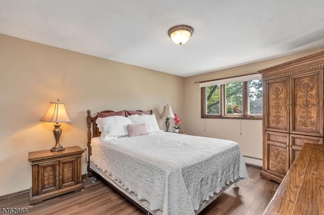 219 Elm Ct, Scotch Plains Twp, NJ 07076 - bedroom featuring a baseboard radiator and wood finished floors