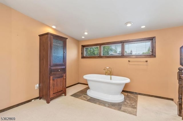 219 Elm Ct, Scotch Plains Twp, NJ 07076 - bathroom featuring a freestanding tub, baseboards, and recessed lighting