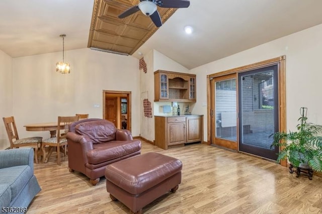 219 Elm Ct, Scotch Plains Twp, NJ 07076 - living area with vaulted ceiling, light wood finished floors, a chandelier, and a ceiling fan