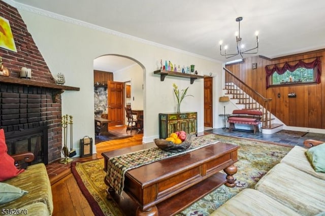 261 Brooklake Rd, Florham Park Boro, NJ 07932 - living area with hardwood / wood-style flooring, arched walkways, a chandelier, ornamental molding, and stairway