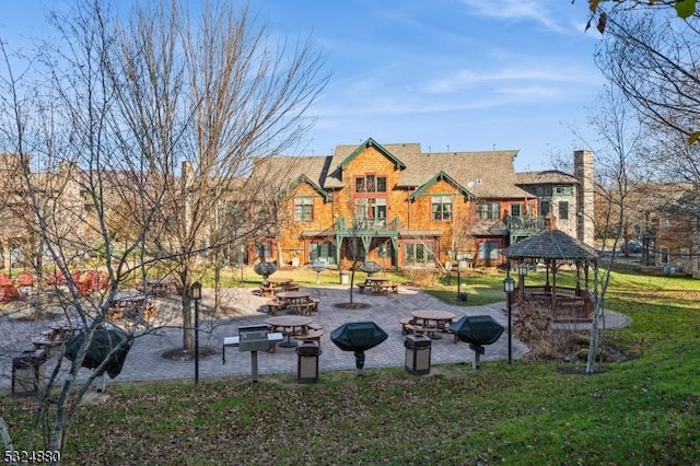 5 Pine Cres Unit 11, Vernon Twp, NJ 07462 - view of property's community featuring a gazebo, a patio, and a yard