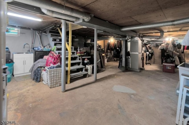 38 Hawthorne Dr, Franklin Twp, NJ 08873 - unfinished below grade area with heating unit and a sink