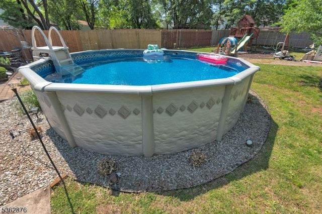 38 Hawthorne Dr, Franklin Twp, NJ 08873 - view of pool featuring a playground