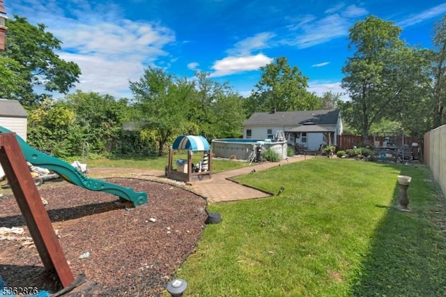 38 Hawthorne Dr, Franklin Twp, NJ 08873 - view of yard with a playground and an outdoor structure