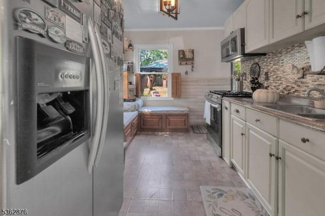 38 Hawthorne Dr, Franklin Twp, NJ 08873 - kitchen with appliances with stainless steel finishes, crown molding, a sink, and white cabinetry