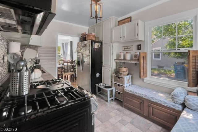 38 Hawthorne Dr, Franklin Twp, NJ 08873 - kitchen with stainless steel fridge, extractor fan, ornamental molding, gas stove, and white cabinetry