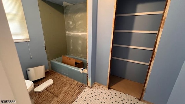 89 Mackerley Rd, Green Twp, NJ 07860 - bathroom featuring toilet, tile patterned floors, and tub / shower combination