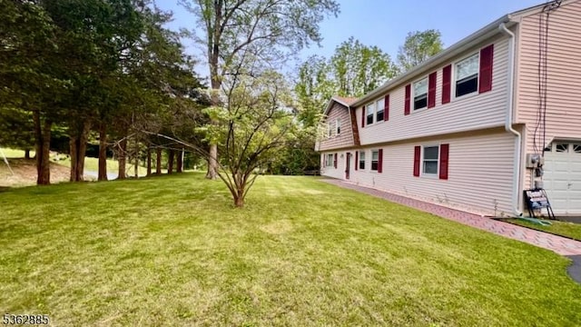 89 Mackerley Rd, Green Twp, NJ 07860 - view of green lawn with an attached garage