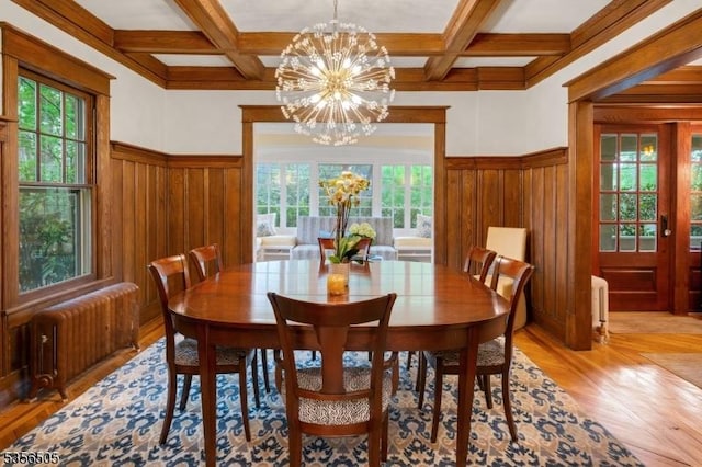 34 Crane Rd, Mountain Lakes Boro, NJ 07046 - dining area featuring radiator heating unit, beamed ceiling, plenty of natural light, a chandelier, and light wood finished floors