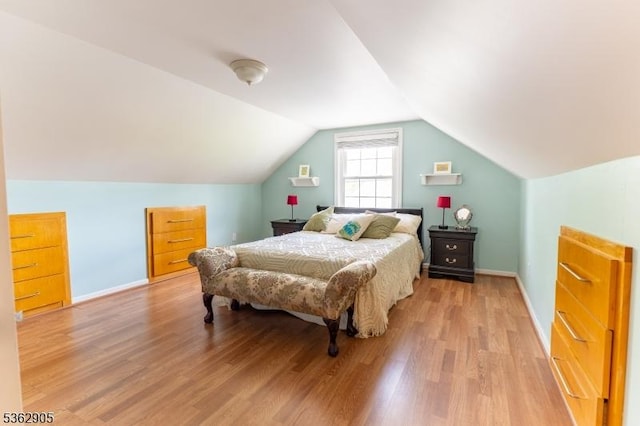 550 Melrose Ave, South Plainfield Boro, NJ 07080 - bedroom with light wood-style flooring, vaulted ceiling, and baseboards