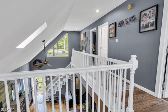 72 Quenby Mountain Rd, Liberty Twp, NJ 07838 - stairway with a skylight, lofted ceiling, wood finished floors, baseboards, and ceiling fan