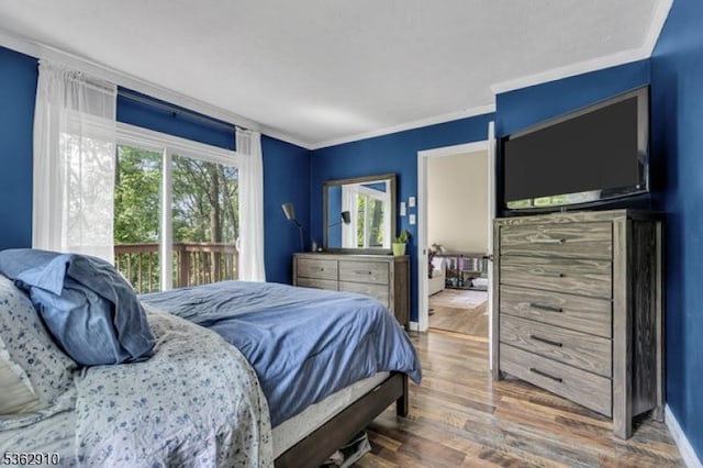 72 Quenby Mountain Rd, Liberty Twp, NJ 07838 - bedroom featuring crown molding, wood finished floors, access to outside, and baseboards
