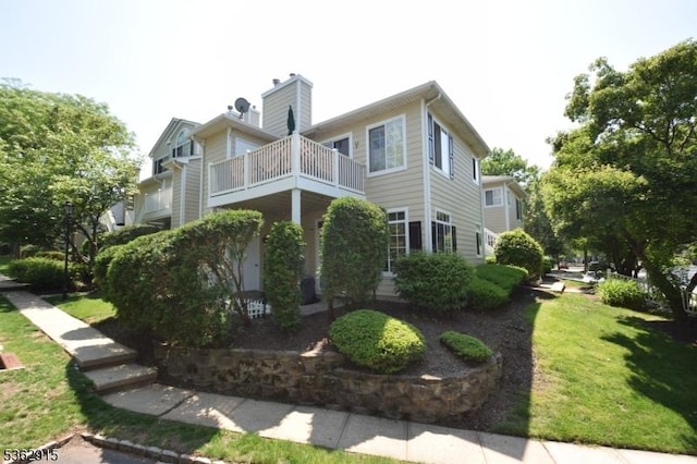 97 Wescott Rd, Bedminster Twp, NJ 07921 - view of property exterior with a balcony, a chimney, and a lawn