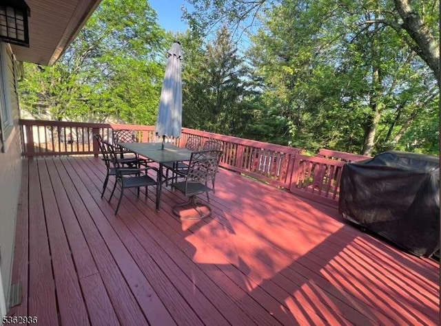10 Grandin Dr, Raritan Twp, NJ 08822 - wooden deck with outdoor dining area and a grill