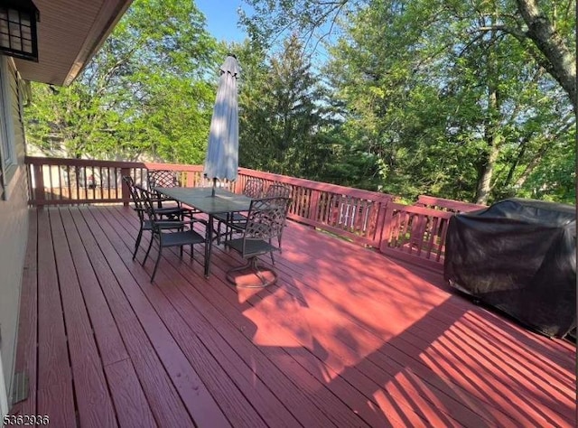 10 Grandin Dr, Raritan Twp, NJ 08822 - deck with outdoor dining area and a grill