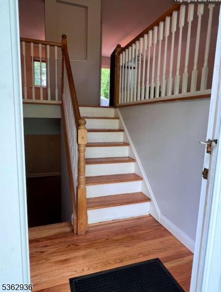 10 Grandin Dr, Raritan Twp, NJ 08822 - staircase featuring wood finished floors and baseboards