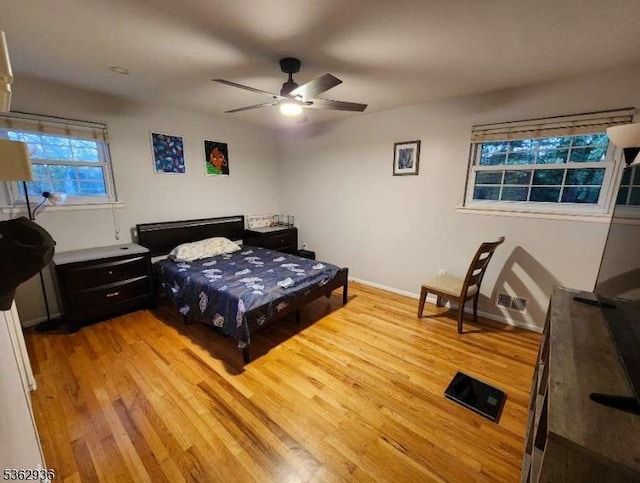 10 Grandin Dr, Raritan Twp, NJ 08822 - bedroom featuring light wood-type flooring, baseboards, and a ceiling fan