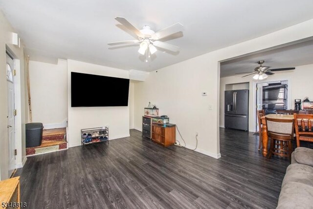 13 Franklin Pl, Wanaque Boro, NJ 07420 - living room featuring a ceiling fan, wood finished floors, and baseboards