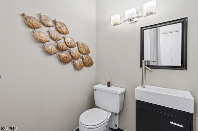 7002 Kennedy Blvd Unit 36G, Guttenberg Town, NJ 07093 - bathroom featuring toilet, vanity, and baseboards