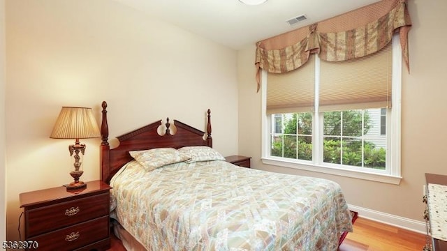 9 Independence Ct, Franklin Twp, NJ 08873 - bedroom with baseboards and wood finished floors