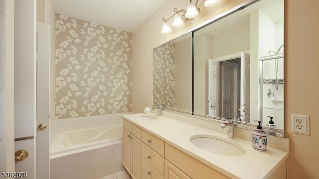 9 Independence Ct, Franklin Twp, NJ 08873 - bathroom with double vanity, a bath, and wallpapered walls