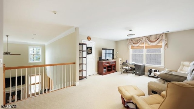9 Independence Ct, Franklin Twp, NJ 08873 - carpeted living area featuring a ceiling fan, ornamental molding, and a desk