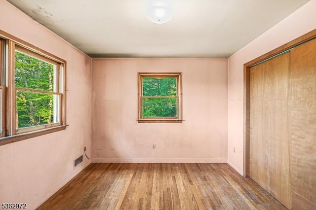 16 Sunset Trl, Rockaway Twp, NJ 07866 - unfurnished room with hardwood / wood-style flooring and baseboards