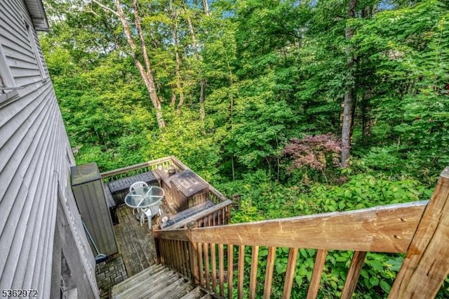 16 Sunset Trl, Rockaway Twp, NJ 07866 - wooden terrace with a wooded view